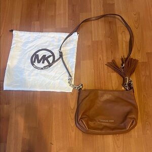 Barely worn Michael Kors Tan Leather Crossbody Bag with Tassel